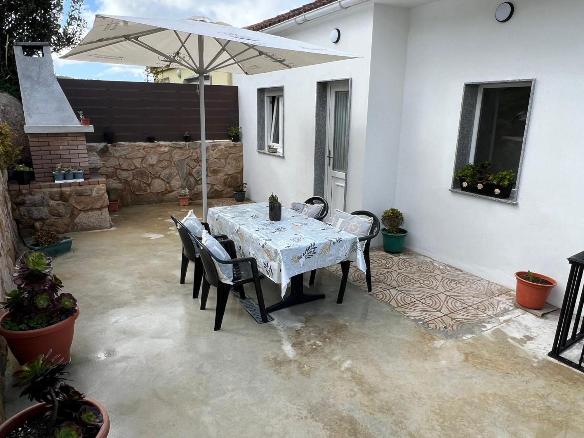 O Cobijo De Elva Villa Arou Bagian luar foto