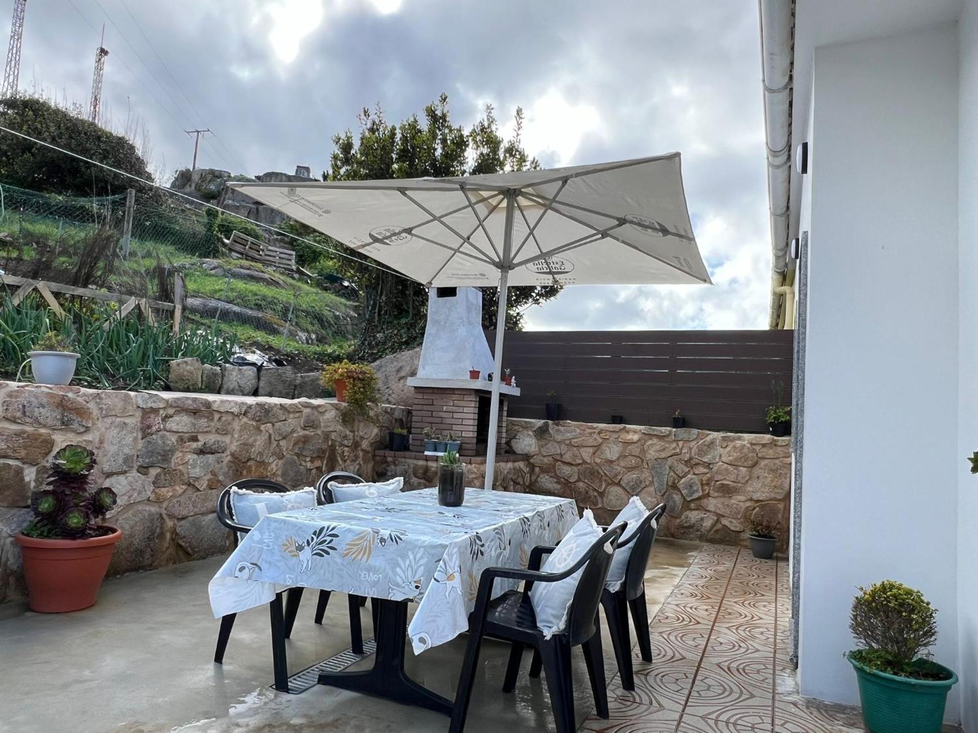 O Cobijo De Elva Villa Arou Bagian luar foto