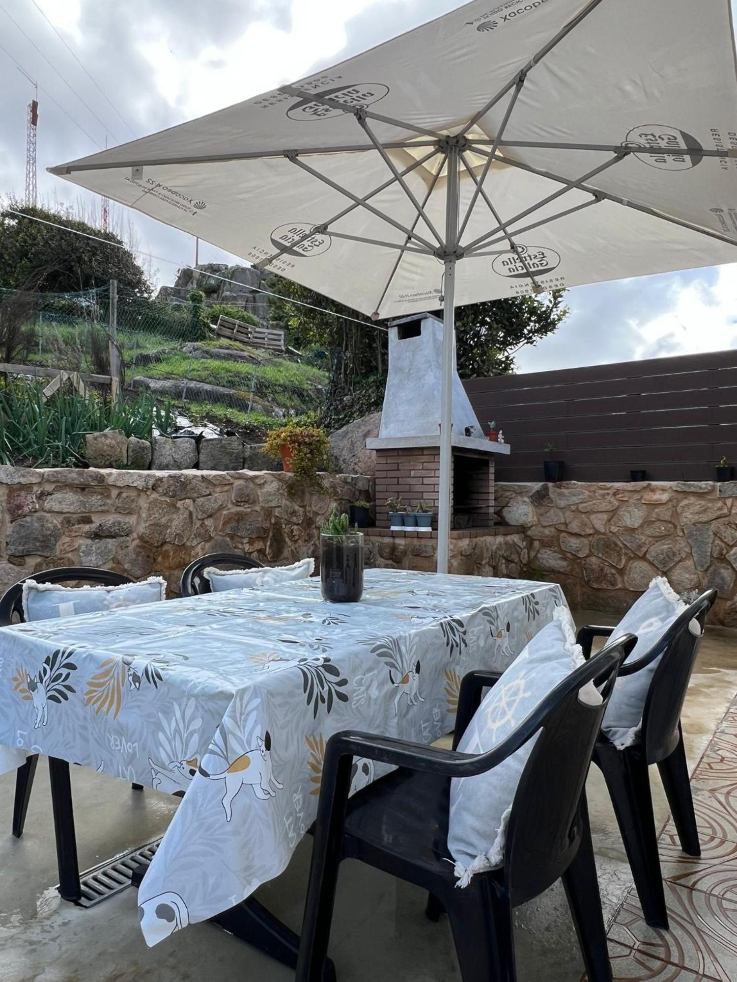 O Cobijo De Elva Villa Arou Bagian luar foto