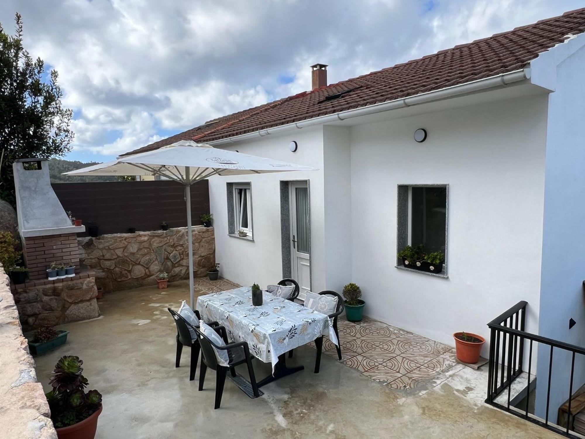 O Cobijo De Elva Villa Arou Bagian luar foto